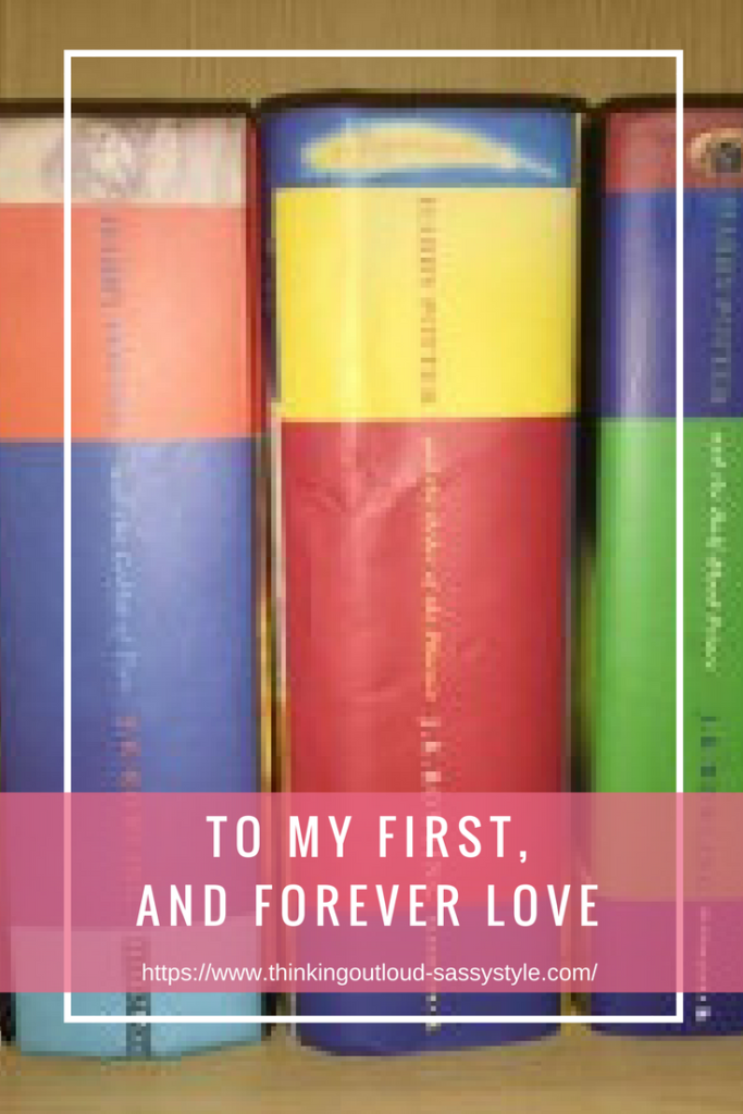 Books on a shelf. Text overlay 'TO MY FIRST, AND FOREVER LOVE'