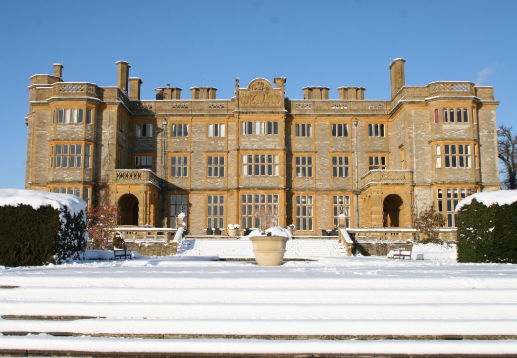 Eynsham Hall with a blanket of snow covering the grounds