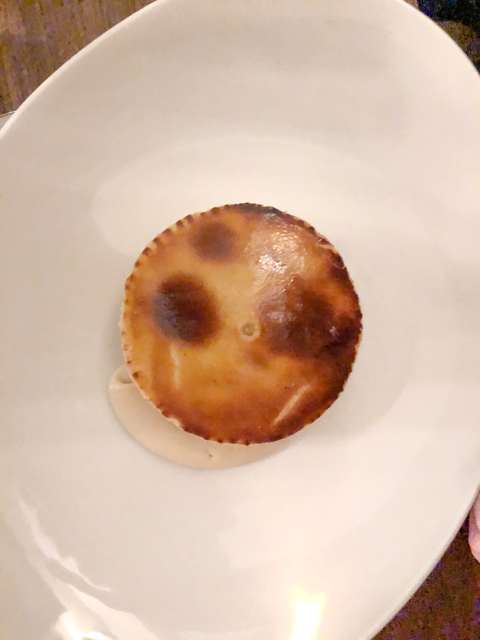 Smoked Chicken, Sweetcorn & Tarroggon Pie sitting on top of a cauliflower Puree