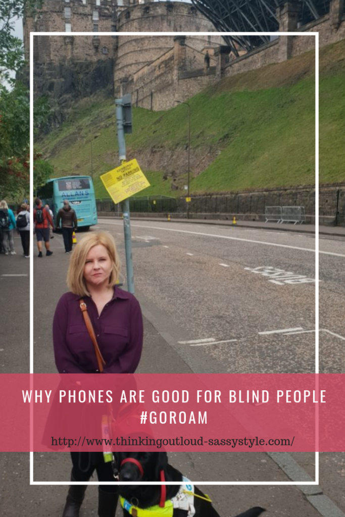 Sassy and ida standing on the street with Edinburgh castle in the background