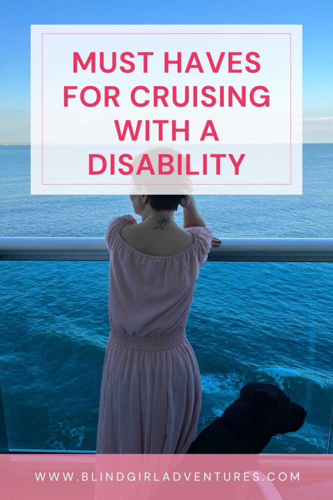 Must Haves for a Cruise for Disabled People pin - it shows Sassy with the back at the camera, leaning on the banister of her balcony on the cruise, watching the sea. She is wearing a light pink dress and her hair is short and red. At the bottom right you can see Ida the black Labrador's head.