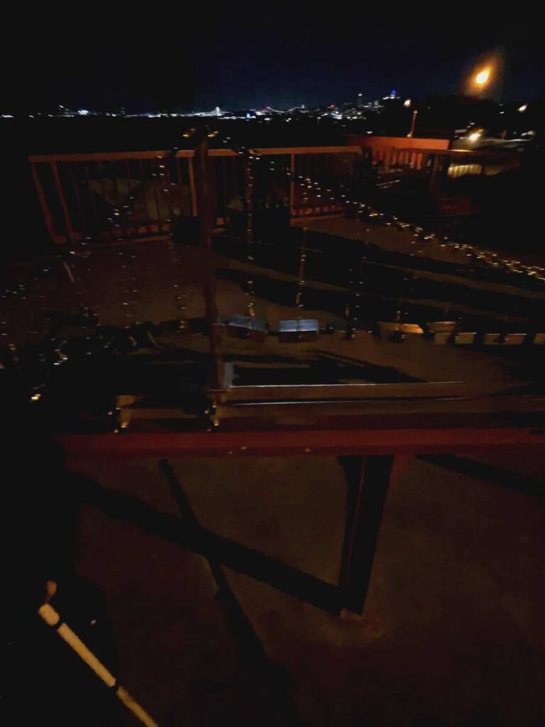 A photo of the 3D to scale model of the Golden Gate bridge, at night.